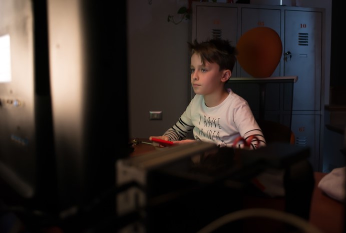 Boy with phone Remote Working 2