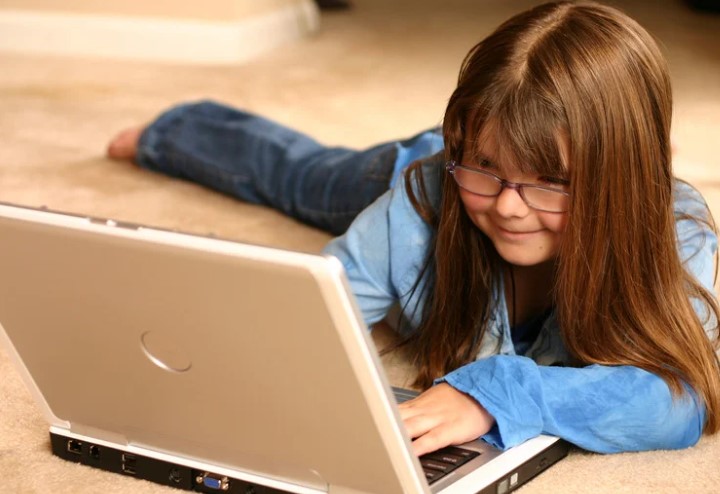 Little girl on laptop Little girl on laptop