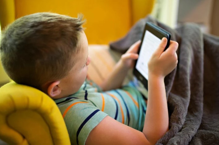 kids with tablet under blanket Remote Working 2